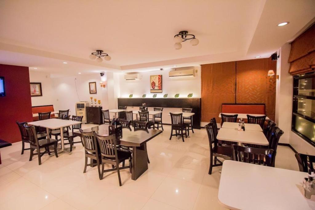 The Red Palm Suites And Restaurant Butuan City Exterior photo