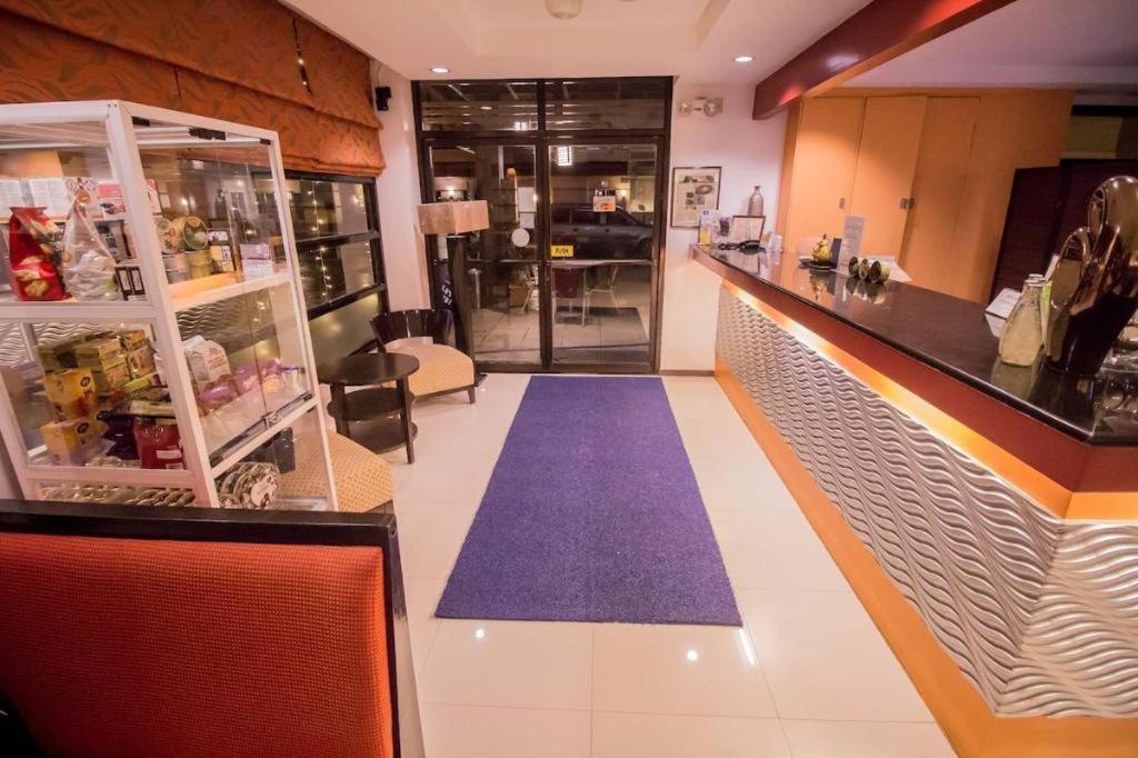 The Red Palm Suites And Restaurant Butuan City Exterior photo