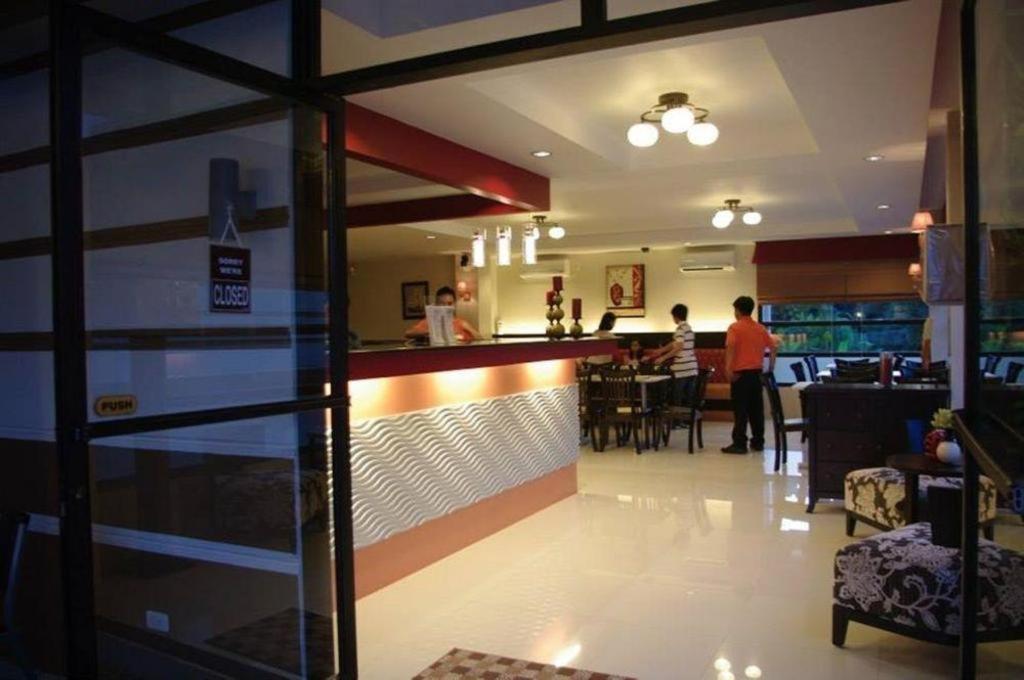 The Red Palm Suites And Restaurant Butuan City Exterior photo