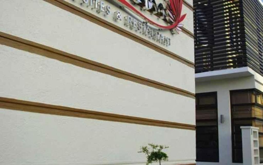 The Red Palm Suites And Restaurant Butuan City Exterior photo