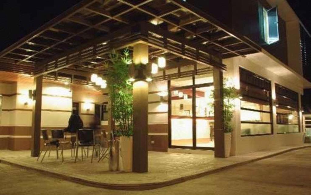 The Red Palm Suites And Restaurant Butuan City Exterior photo